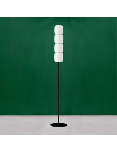Design floor lamp in Murano glass with white satin lampshades on a green background