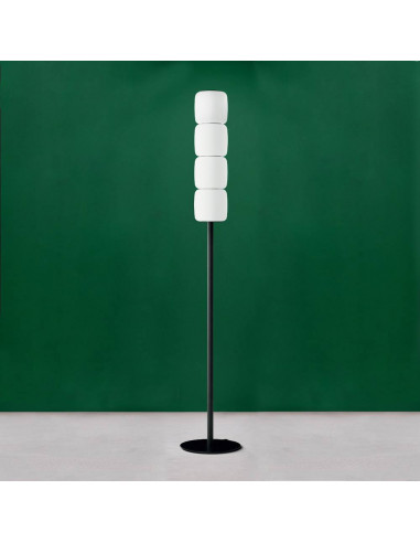 Design floor lamp in Murano glass with white satin lampshades on a green background